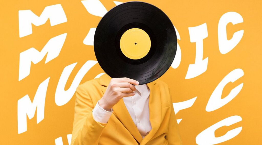 Man holding a vinyl